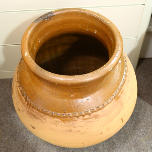 273 - A Mediterranean terracotta oil jar, height 58cm