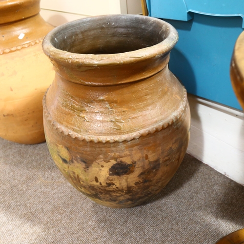 274 - A Mediterranean terracotta oil jar, height 55cm