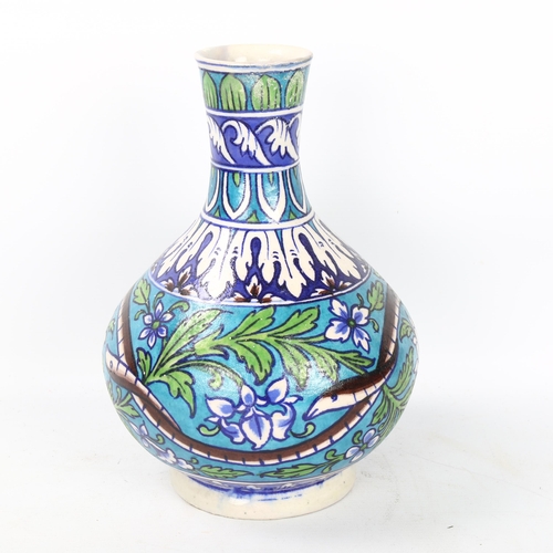 129 - An Iznik pottery vase, hand painted snake decoration, height 24cm