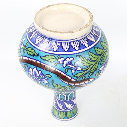 129 - An Iznik pottery vase, hand painted snake decoration, height 24cm