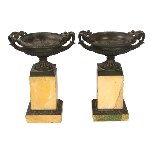 131 - A pair of 19th century bronze tazza urns on Sienna marble plinths, height 23.5cm