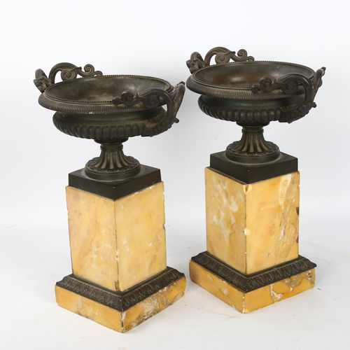 131 - A pair of 19th century bronze tazza urns on Sienna marble plinths, height 23.5cm