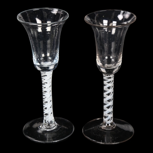 132 - 2 similar 18th century cordial glasses with milk twist stems, height 17cm