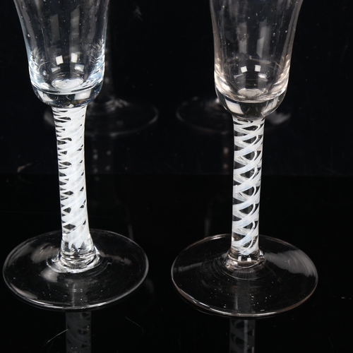 132 - 2 similar 18th century cordial glasses with milk twist stems, height 17cm