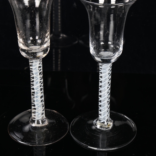 133 - 2 similar 18th century cordial glasses with milk twist stems, height 17cm