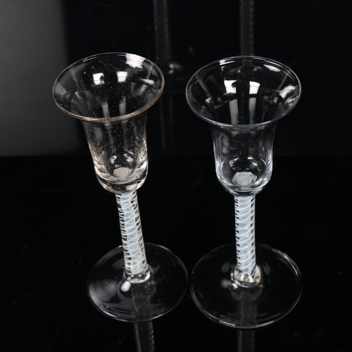 133 - 2 similar 18th century cordial glasses with milk twist stems, height 17cm