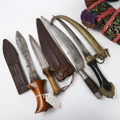 165 - A group of Middle Eastern knives (5)