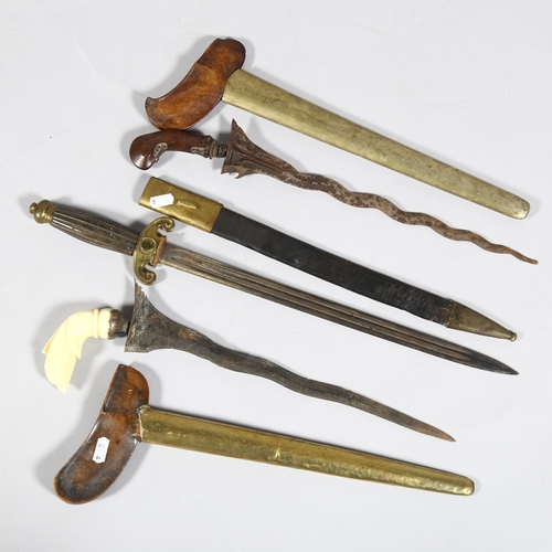 171 - **WITHDRAWN** 2 Malayan Kris daggers, and another brass-mounted dagger, all with original sheaths (3... 