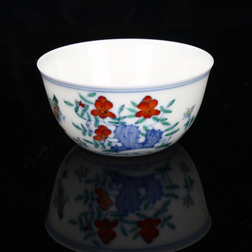 180 - A Chinese porcelain chicken cup, hand painted decoration and 6 character mark, diameter 8cm