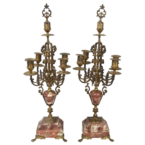 196 - A pair of French gilt-brass and rouge marble candelabra, circa 1900, height 56cm