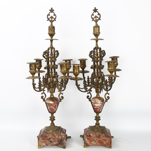 196 - A pair of French gilt-brass and rouge marble candelabra, circa 1900, height 56cm