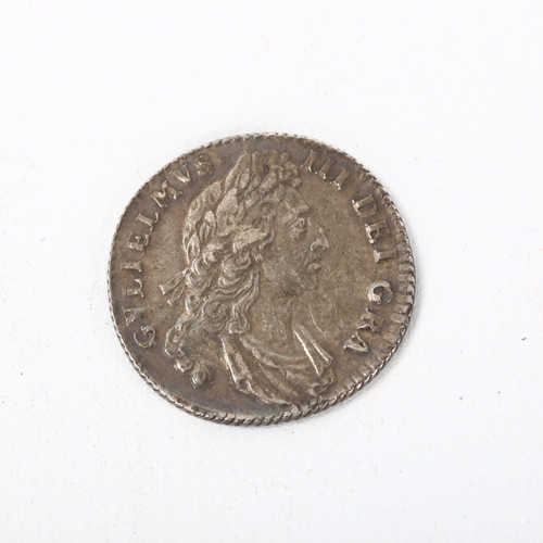 219 - A William III silver shilling dated 1697, 6g, diameter 25.4mm