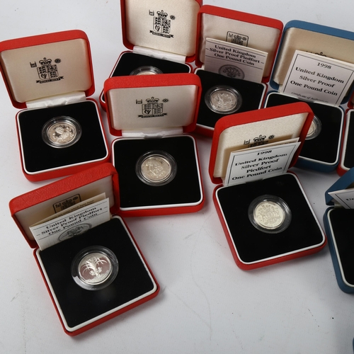 248 - 12 silver proof One Pound coins, in presentation cases, some with certificates