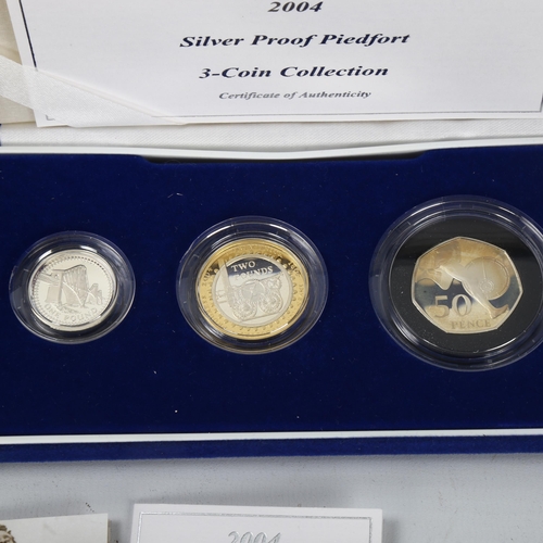 252 - A 2004 silver proof Piedfort 3-Coin Collection, and Elizabeth and Philip 50th Anniversary Coin