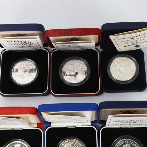 254 - A collection of 7 Silver Proof Commemorative coins, in presentation boxes with certificates