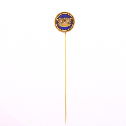 1105 - An Antique blue enamel ruby emerald and diamond crown stickpin, unmarked gold settings with engine t... 