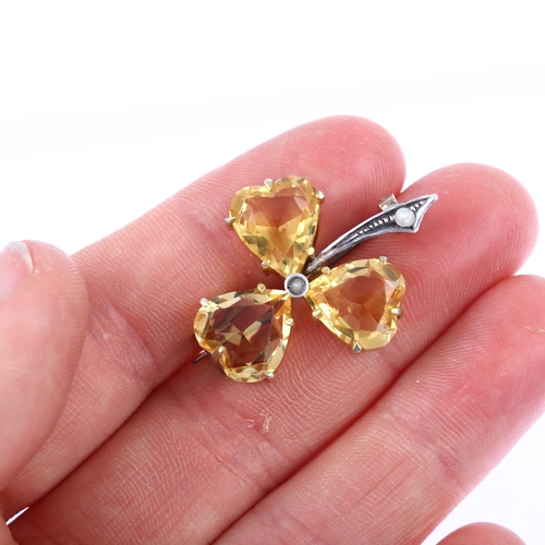 1117 - An Edwardian citrine and pearl shamrock brooch, circa 1905, unmarked gilt white metal settings with ... 