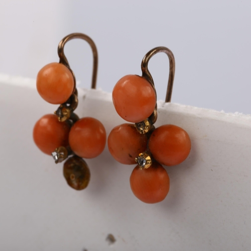 1125 - A pair of Victorian coral and diamond drop earrings, unmarked gold closed-back settings with round c... 