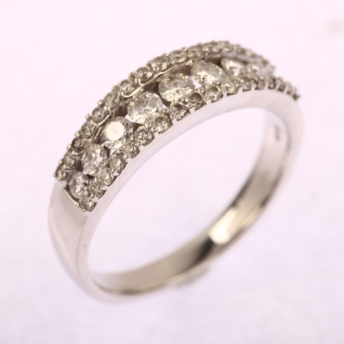 1126 - A modern 18ct white gold diamond half eternity band ring, set with modern round brilliant-cut diamon... 