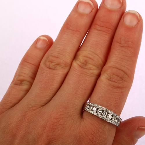 1126 - A modern 18ct white gold diamond half eternity band ring, set with modern round brilliant-cut diamon... 