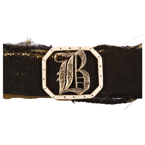 1136 - A Victorian 15ct gold diamond and enamel initial B mourning bracelet, with moire silk band, setting ... 