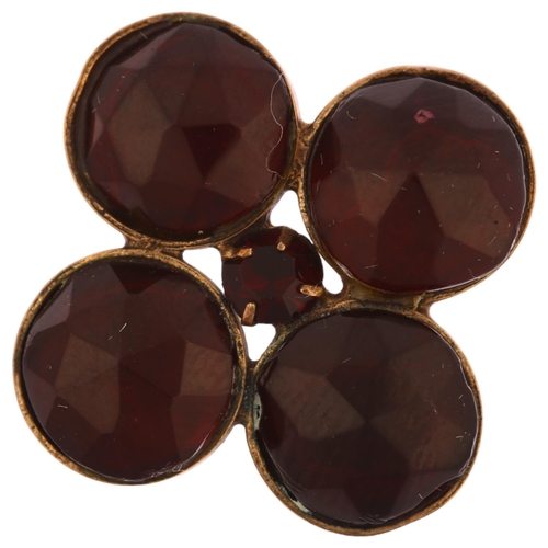 1137 - A large Victorian Bohemian garnet quatrefoil ring, unmarked yellow metal closed-back settings, with ... 