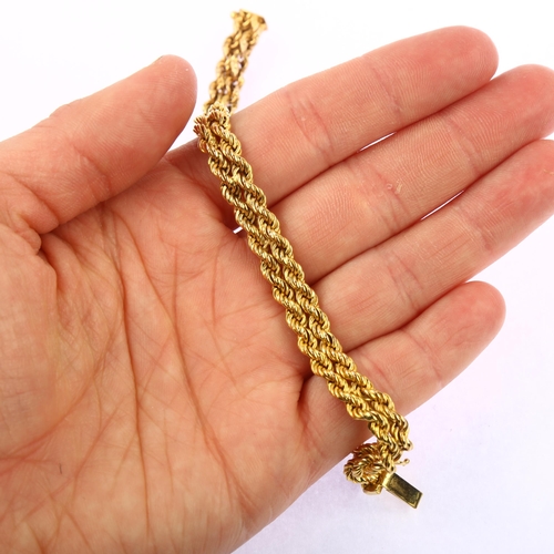 1141 - An Italian 9ct gold double rope twist chain bracelet, band width 7mm, internal circumference 16cm, 1... 