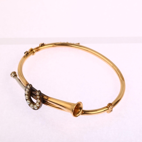 1148 - A Victorian 15ct gold split pearl hunting horn and horseshoe hinged bangle, horseshoe height 13.2mm,... 