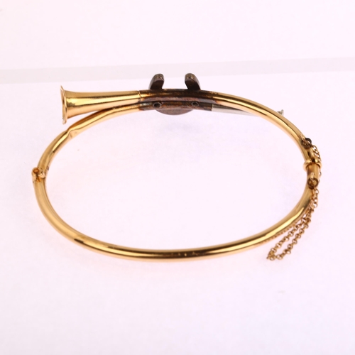 1148 - A Victorian 15ct gold split pearl hunting horn and horseshoe hinged bangle, horseshoe height 13.2mm,... 