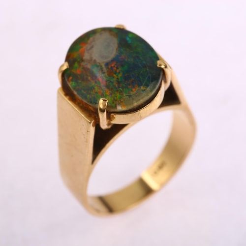 1150 - A late 20th century 14ct gold opal triplet ring, setting height 14.7mm, size P, 9.1g