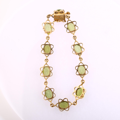 1151 - A late 20th century 9ct gold peridot line bracelet, each flowerhead panel set with an oval mixed-cut... 