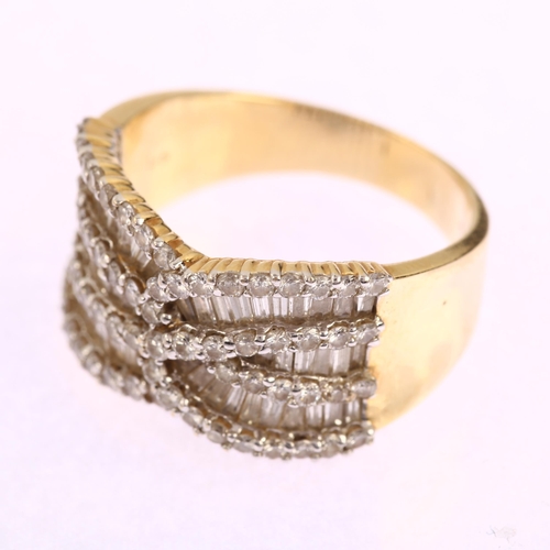 1155 - A modern 14ct gold diamond crossover band ring, set with modern round brilliant and baguette-cut dia... 