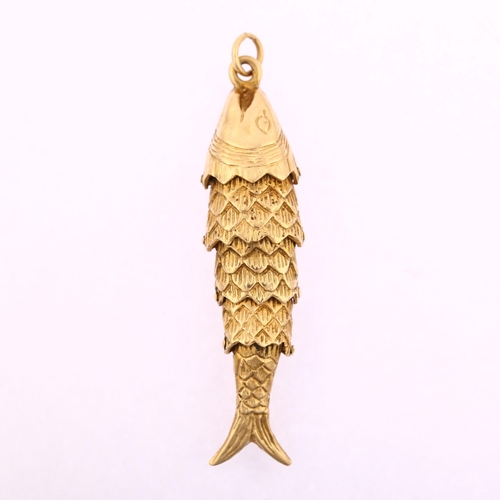 1164 - A late 20th century 9ct gold articulated fish charm/pendant, hallmarks London 1977, pendant height 4... 