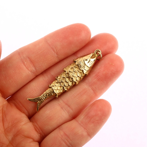 1164 - A late 20th century 9ct gold articulated fish charm/pendant, hallmarks London 1977, pendant height 4... 