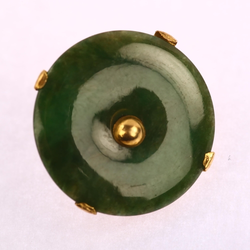 1166 - A Chinese jade Bi disc clip-on earring, unmarked high carat gold closed-back settings, diameter 17mm... 