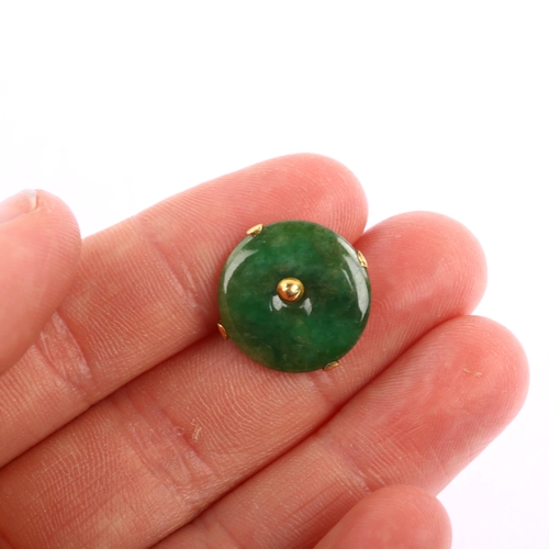 1166 - A Chinese jade Bi disc clip-on earring, unmarked high carat gold closed-back settings, diameter 17mm... 