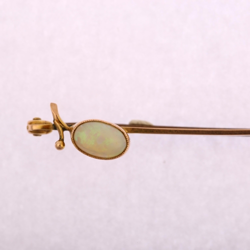 1167 - An early 20th century 9ct gold opal berry bar brooch, bezel set with oval cabochon opal, brooch leng... 