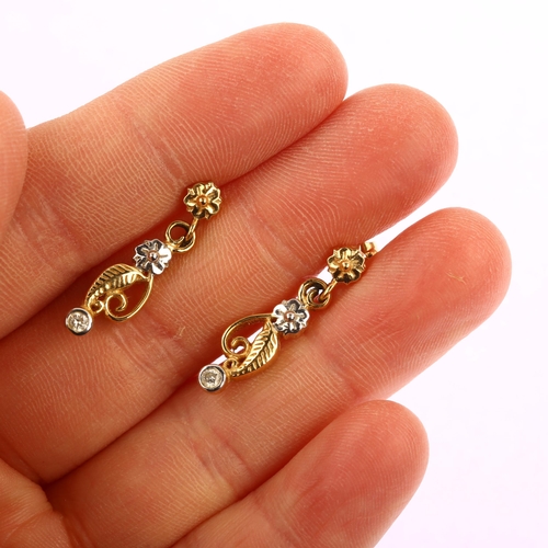 1176 - A pair of 18ct gold diamond floral drop earrings, with stud fittings, total diamond content approx 0... 