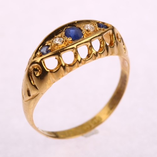 1177 - An early 20th century 18ct gold graduated five stone sapphire and diamond half hoop ring, set with o... 