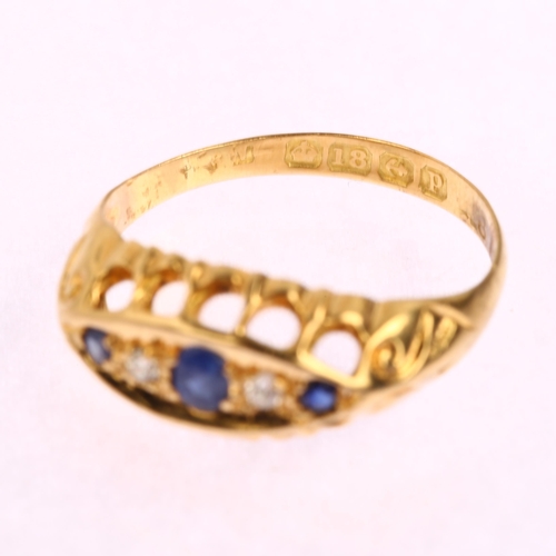 1177 - An early 20th century 18ct gold graduated five stone sapphire and diamond half hoop ring, set with o... 