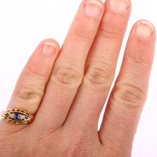 1177 - An early 20th century 18ct gold graduated five stone sapphire and diamond half hoop ring, set with o... 