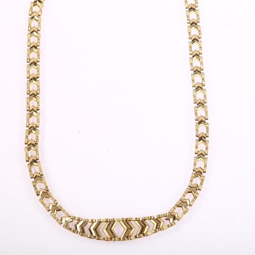 1183 - A late 20th century 9ct gold chevron necklace, maker's marks SJ, hallmarks London 1985, length 39cm,... 