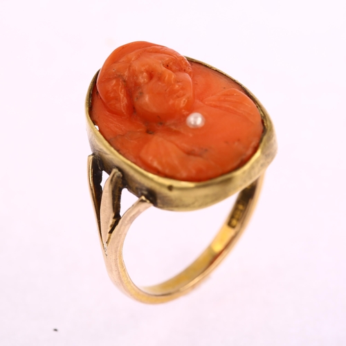 1188 - A 9ct gold coral habille cameo ring, relief carved depicting figure with a pearl necklace, setting h... 