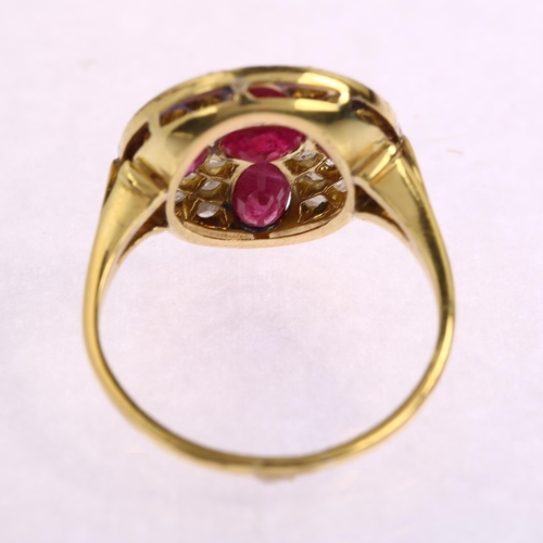 1198 - A late 20th century ruby and diamond circular cluster ring, unmarked 18ct gold settings with oval mi... 