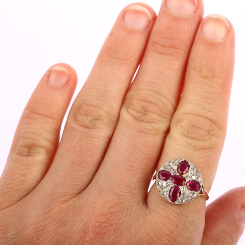 1198 - A late 20th century ruby and diamond circular cluster ring, unmarked 18ct gold settings with oval mi... 