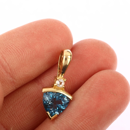 1204 - A modern 9ct gold blue and white topaz pendant, set with trillion-cut topaz, pendant height 21.2mm, ... 