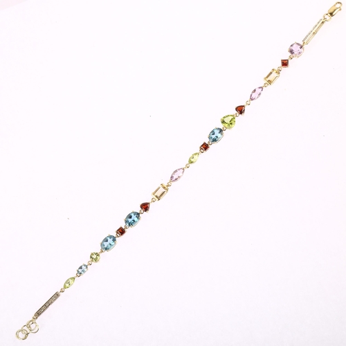 1210 - A modern 9ct gold gem set tennis line bracelet, gemstones include diamond amethyst garnet citrine pe... 