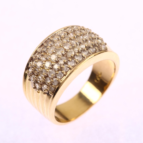 1212 - A modern 18ct gold diamond band ring, prong set with modern round brilliant-cut diamonds, total diam... 