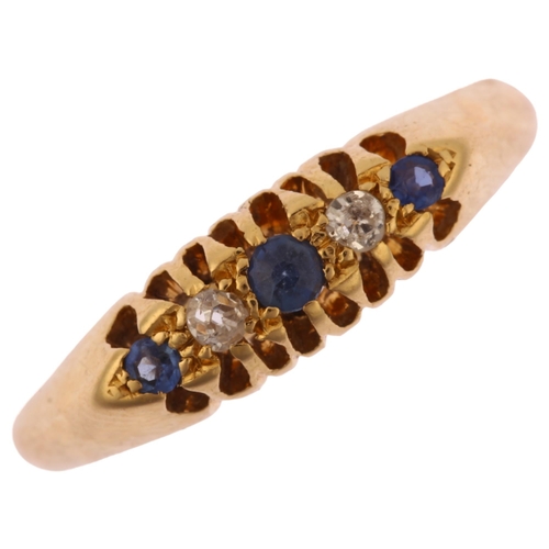 1218 - An early 20th century 18ct gold graduated five stone sapphire and diamond half hoop ring, hallmarks ... 