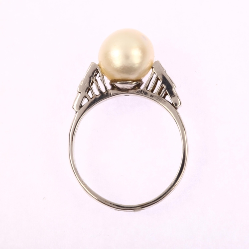 1223 - A Chinese 14ct white gold solitaire whole cultured pearl ring, with baguette-cut diamond shoulders, ... 